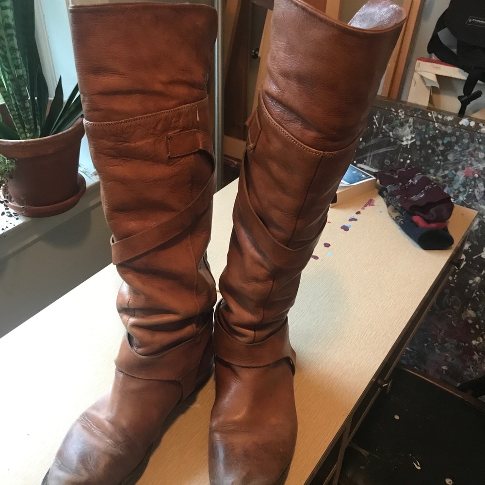 Knee high brown leather boots